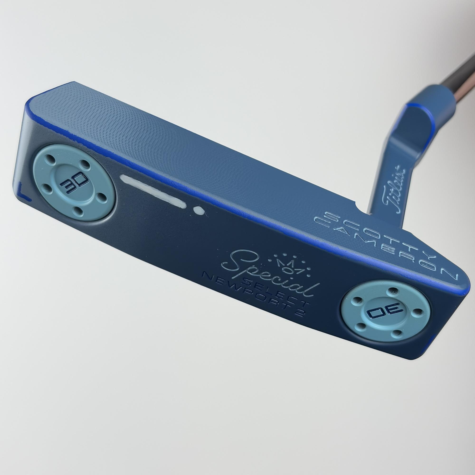 Sole of the custom painted Scotty Cameron Special Select Newport 2, navy to blue gradient with pale blue tungsten sole weights and the Special Select Newport 2 stamping.