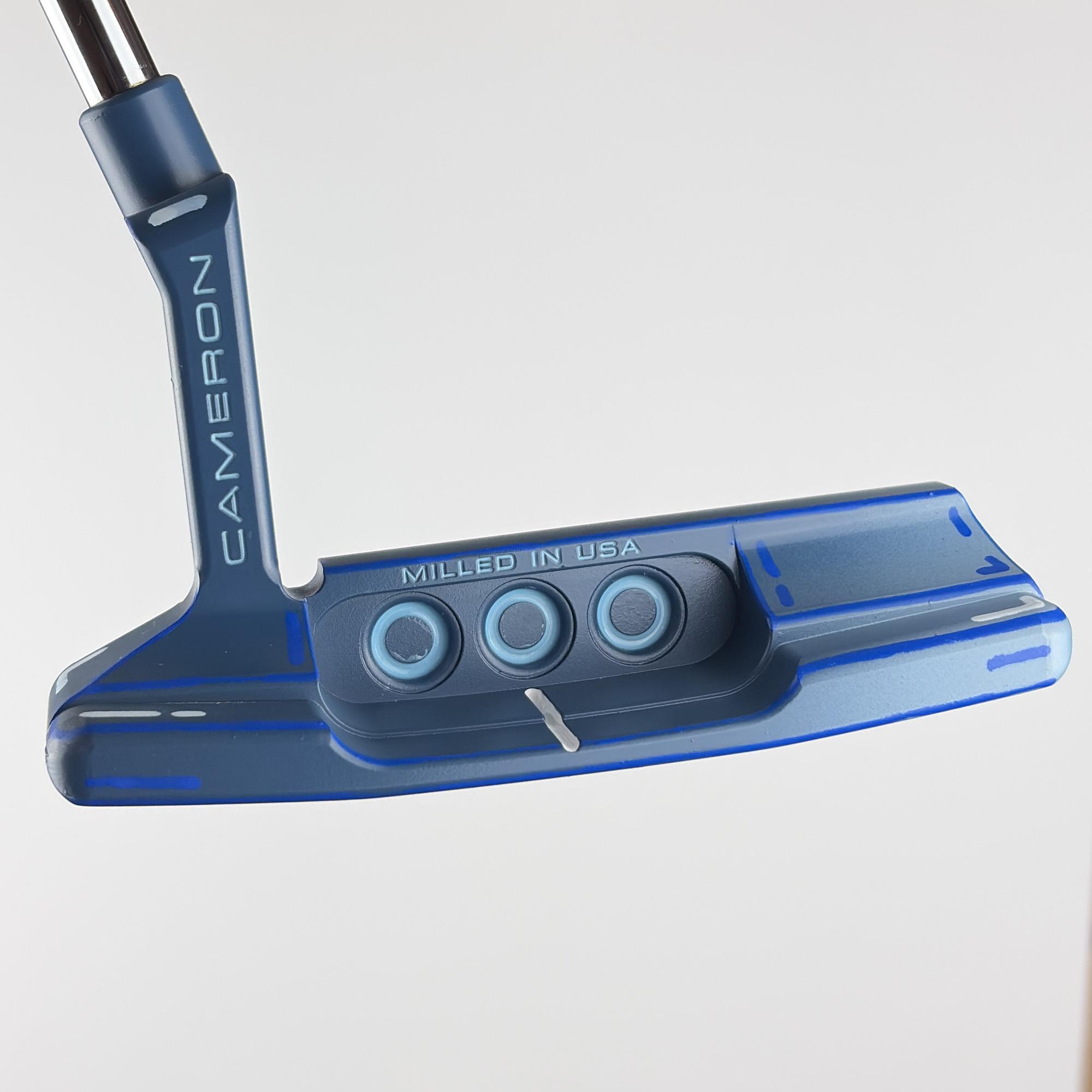 Back cavity of the custom painted Newport 2, three pale blue dots over Milled in USA, the plumbing neck rising in navy.