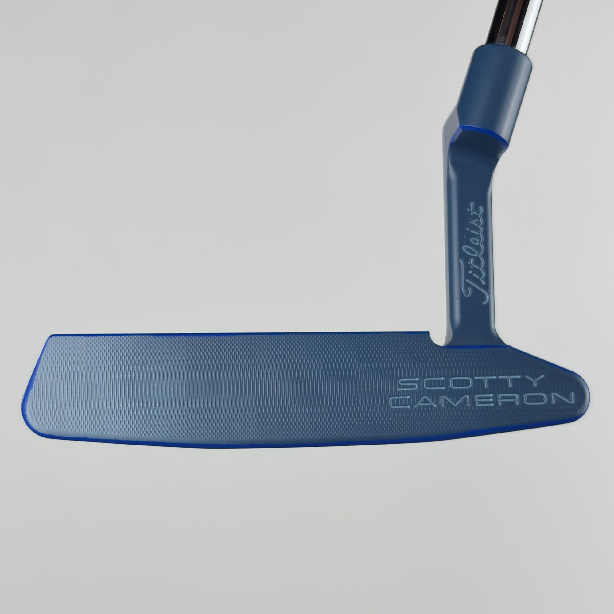 Face-on view of the custom painted Newport 2, the full blade face in navy to blue with the Scotty Cameron stamp at the toe.