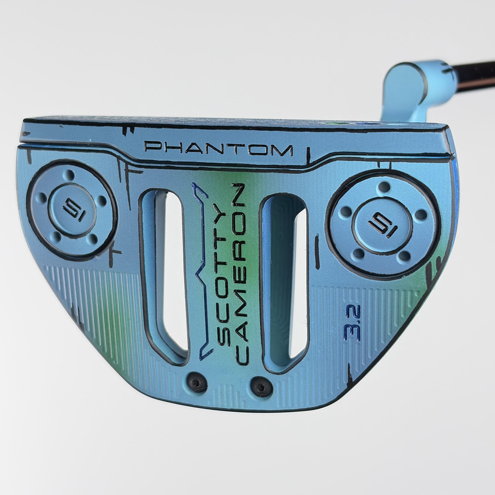Sole of the custom painted Scotty Cameron Phantom 3.2, a blue to green ocean fade with black cel-shaded linework, stamped Phantom, Scotty Cameron and 3.2.