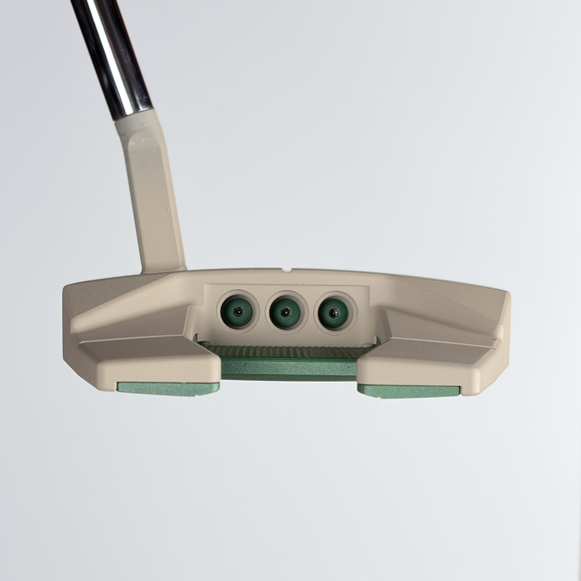 Custom painted Phantom 5.5 at address, three green topline sight dots above a green face.