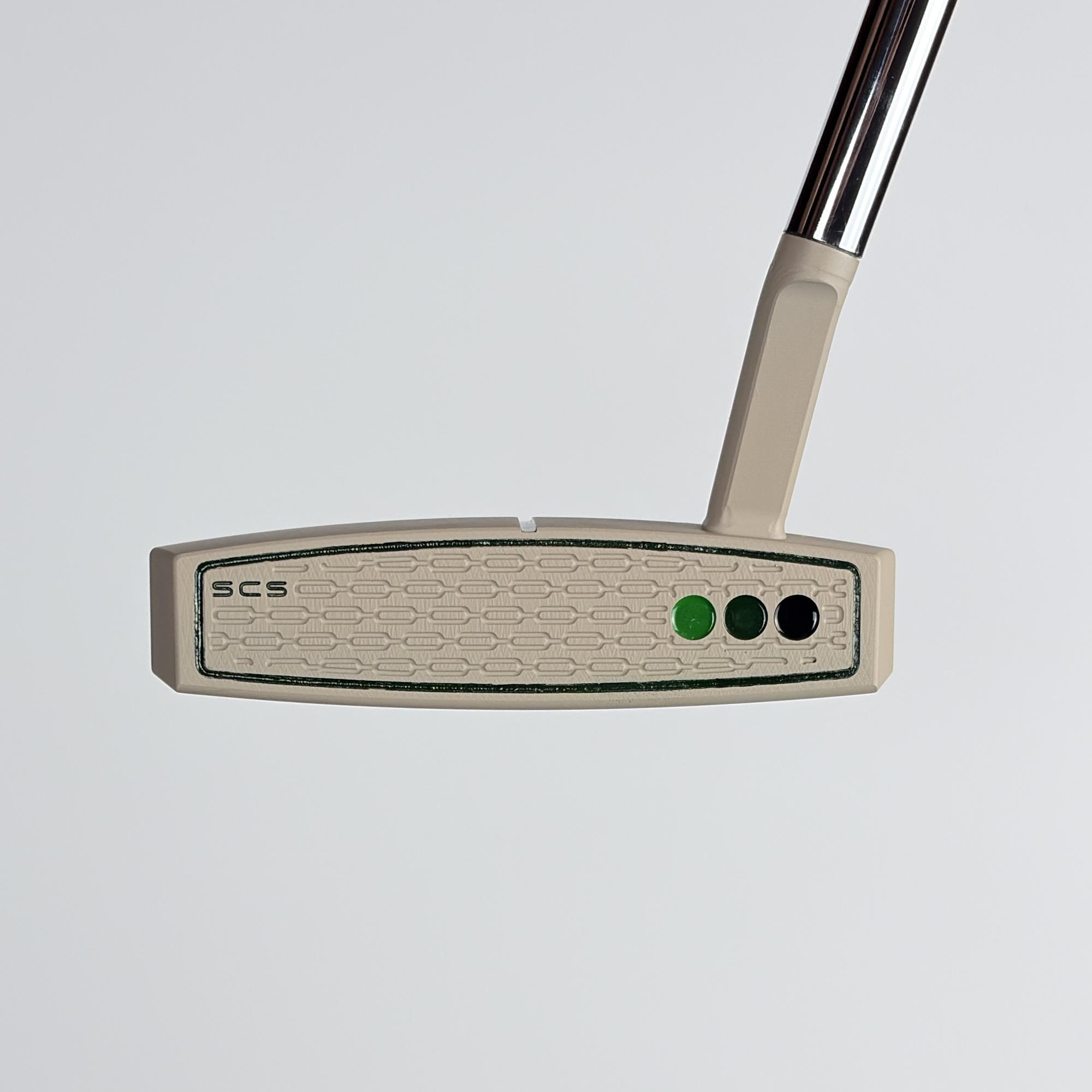 Face of the custom painted Phantom 5.5, the sand Studio Carbon Steel insert with chain-link milling and green sight dots.