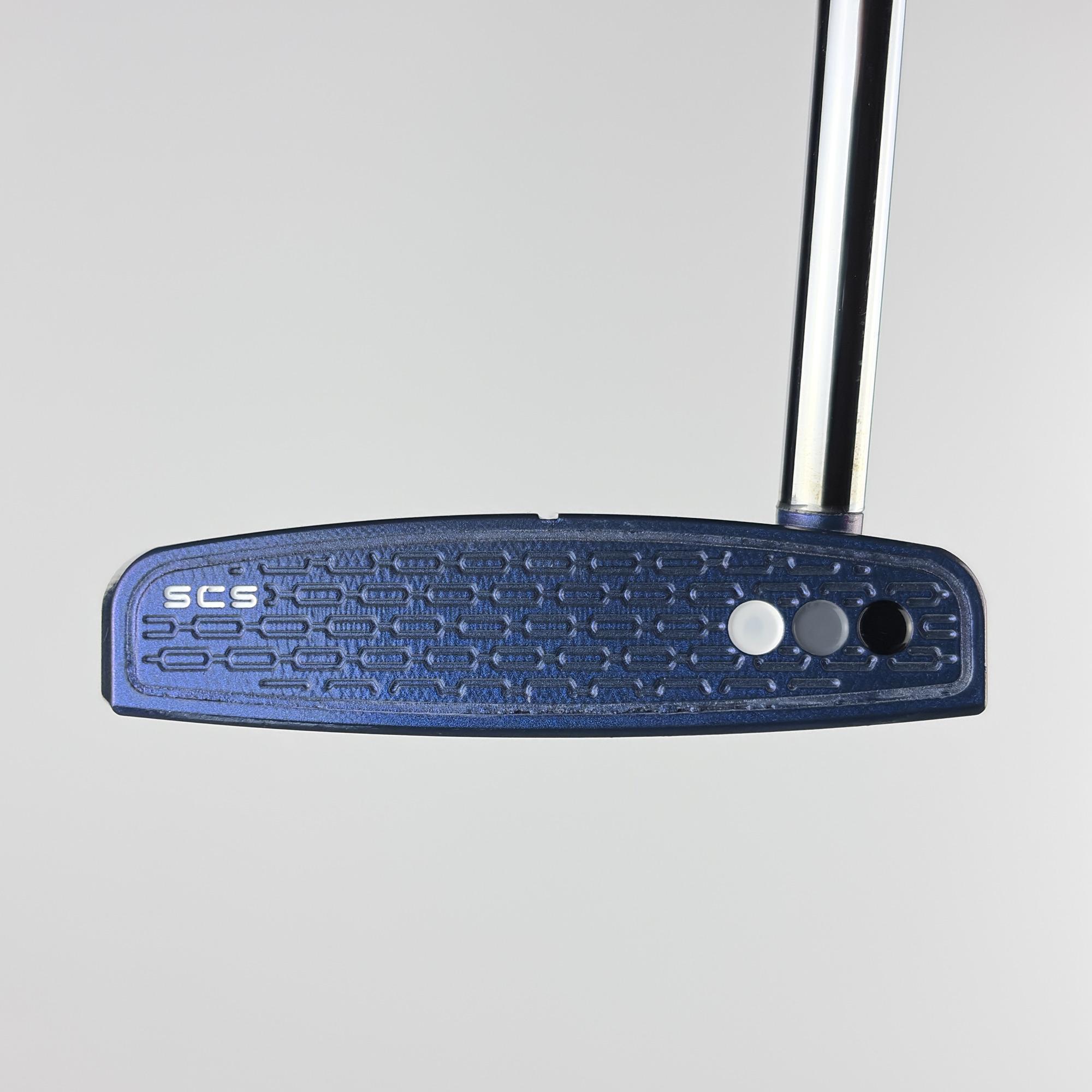 Face of the custom painted Phantom 9R, the blue full-face Studio Carbon Steel insert with chain-link milling.