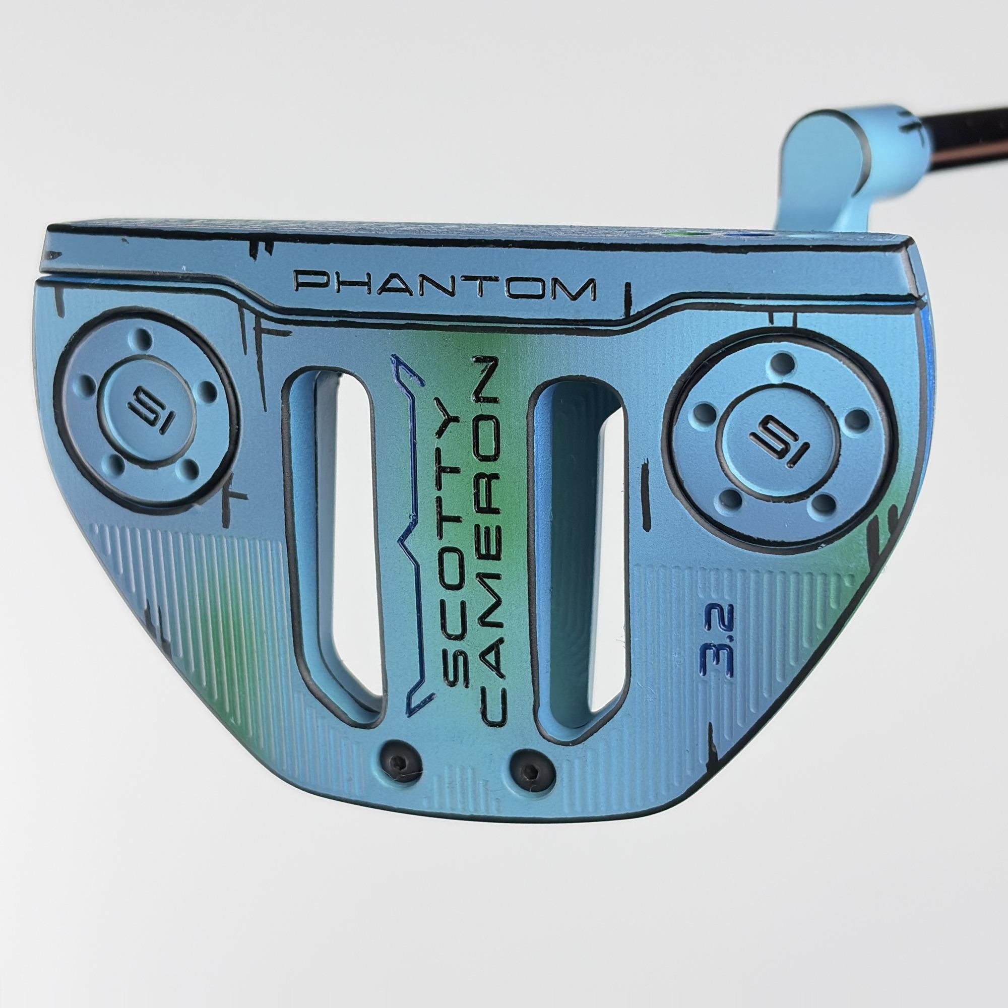 Sole of the custom painted Scotty Cameron Phantom 3.2, a blue to green ocean fade with black cel-shaded linework, stamped Phantom, Scotty Cameron and 3.2.